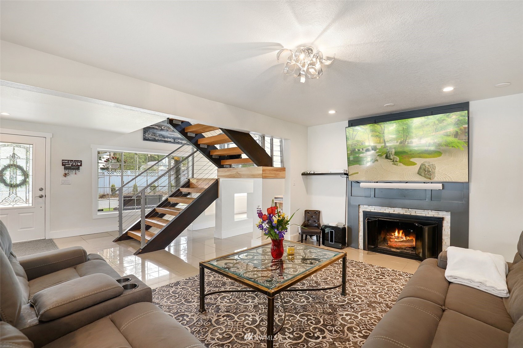 7031 Mullen Road Southeast Olympia, WA 98503 - Photo 11 of 40 a living room with furniture and a fireplace