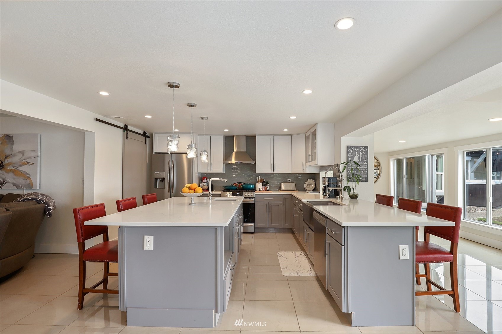 7031 Mullen Road Southeast Olympia, WA 98503 - Photo 14 of 40 a large kitchen with a table and chairs