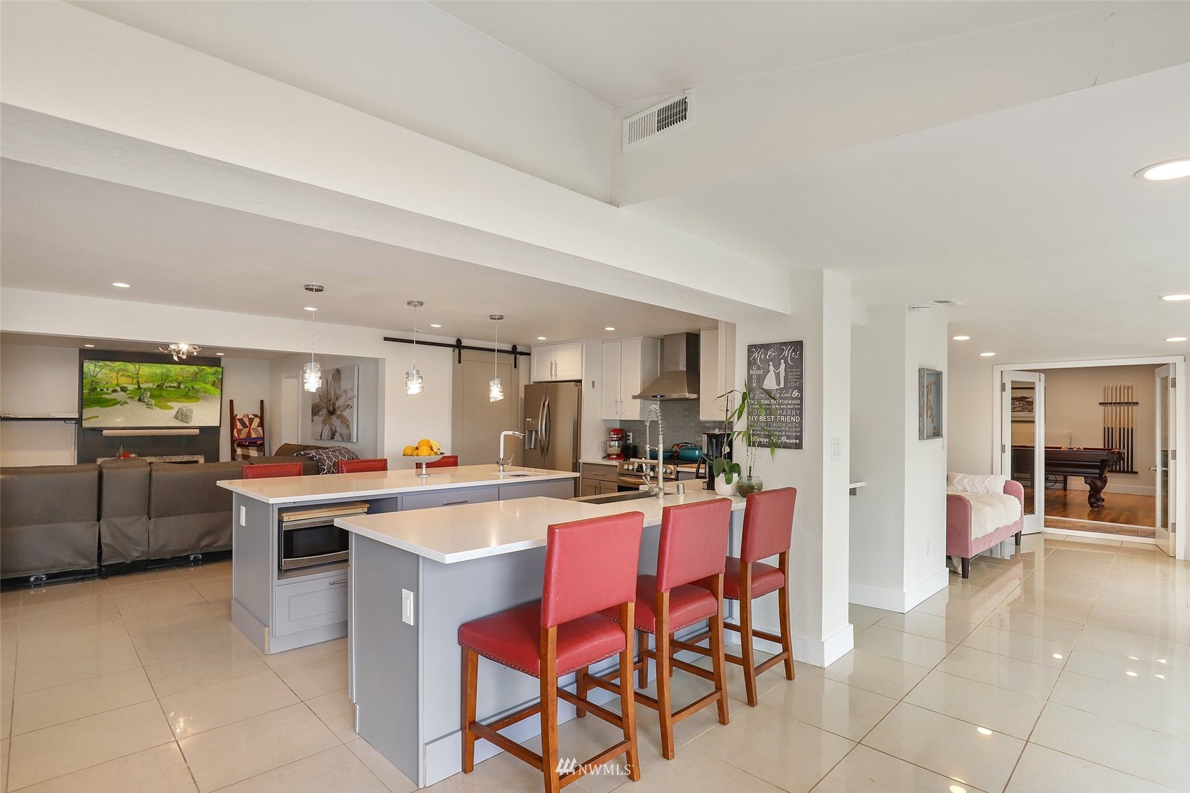 7031 Mullen Road Southeast Olympia, WA 98503 - Photo 17 of 40 a kitchen with stainless steel appliances a stove a sink dishwasher and a refrigerator