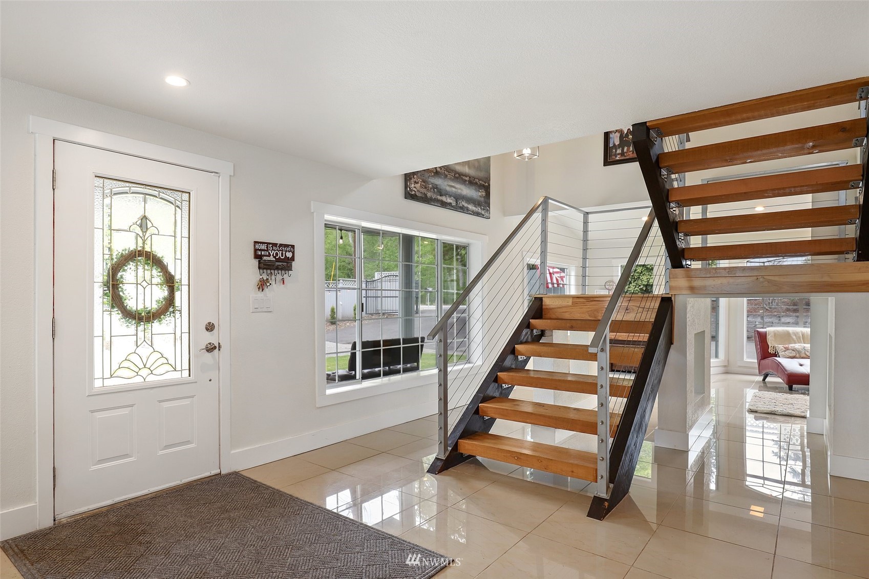 7031 Mullen Road Southeast Olympia, WA 98503 - Photo 2 of 40 a view of entryway and hall with wooden floor