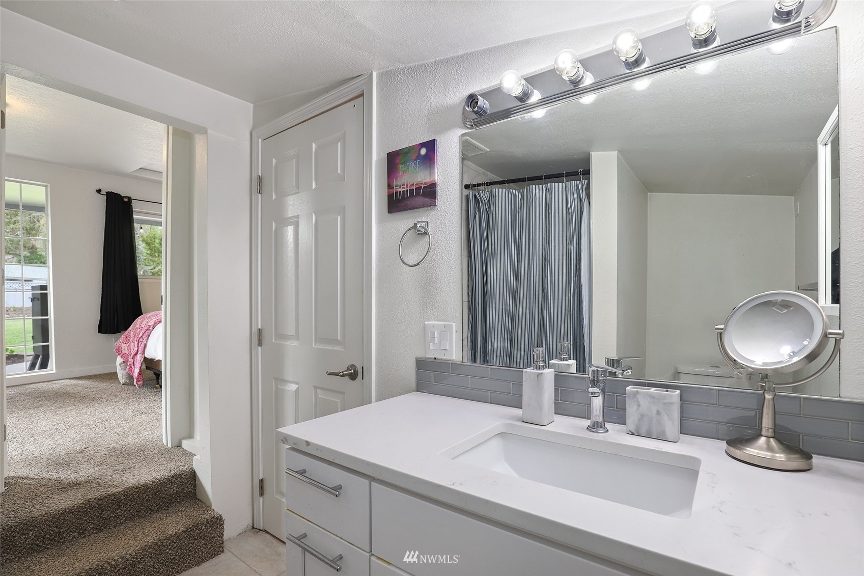 7031 Mullen Road Southeast Olympia, WA 98503 - Photo 28 of 40 a bathroom with a sink double vanity and shower