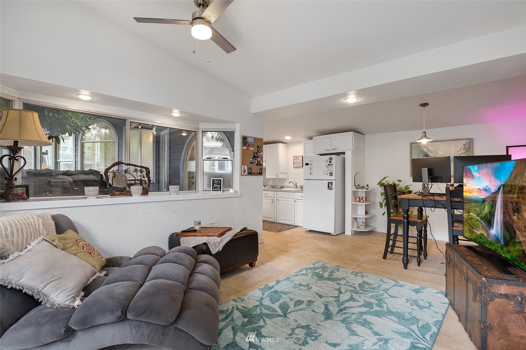 7031 Mullen Road Southeast Olympia, WA 98503 - Photo 30 of 40 a living room with furniture and a flat screen tv