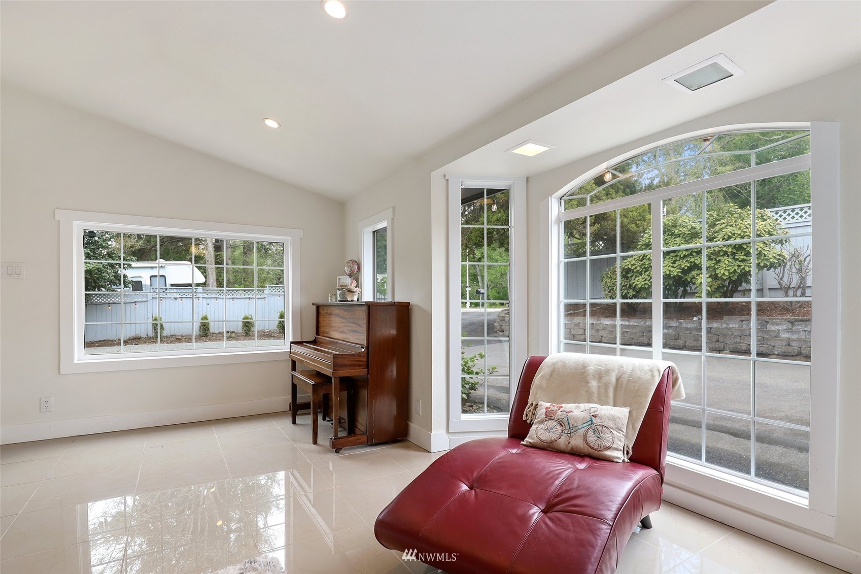 7031 Mullen Road Southeast Olympia, WA 98503 - Photo 3 of 40 a living room with furniture and a floor to ceiling window
