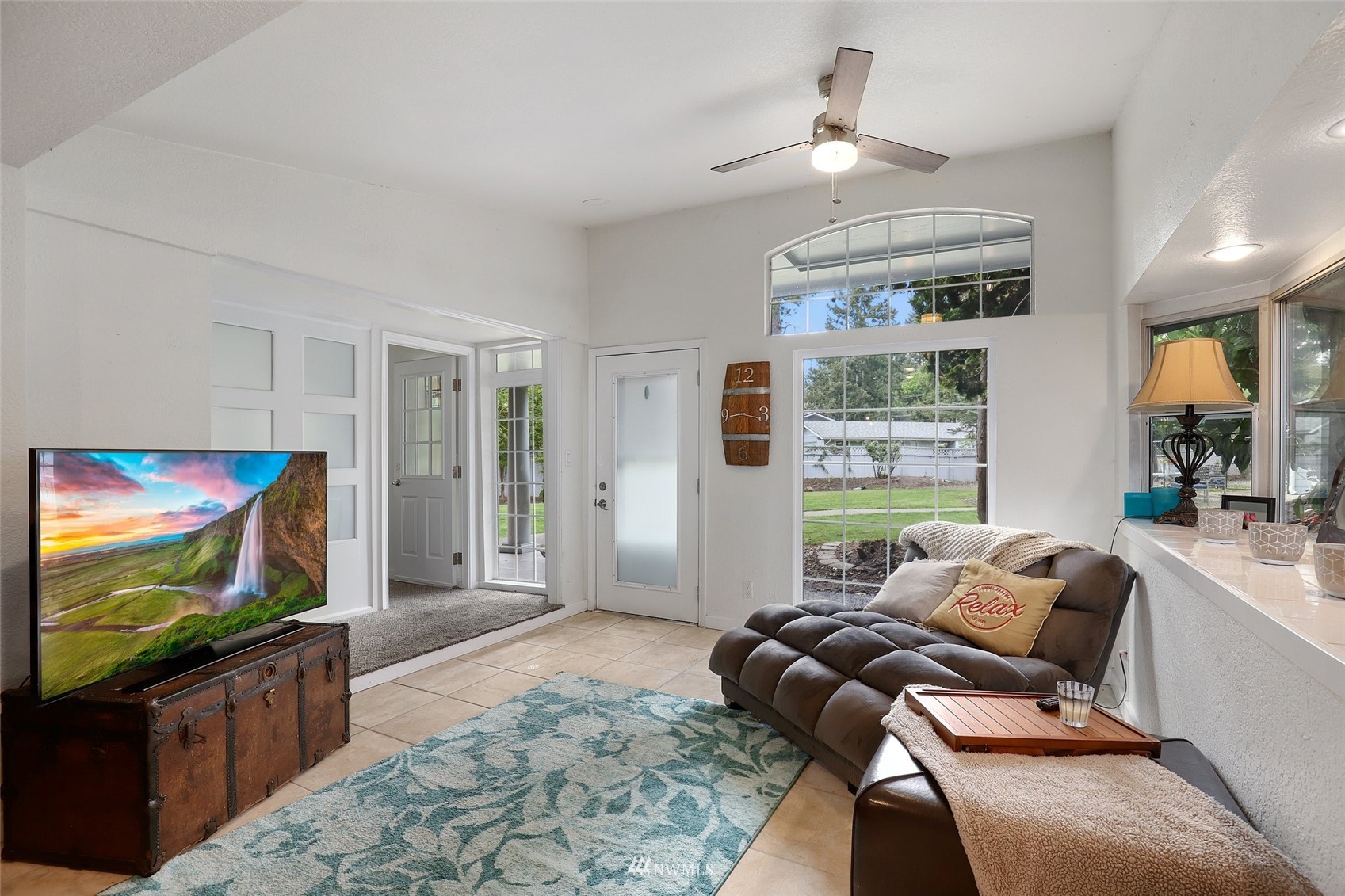7031 Mullen Road Southeast Olympia, WA 98503 - Photo 31 of 40 a living room with furniture and a flat screen tv