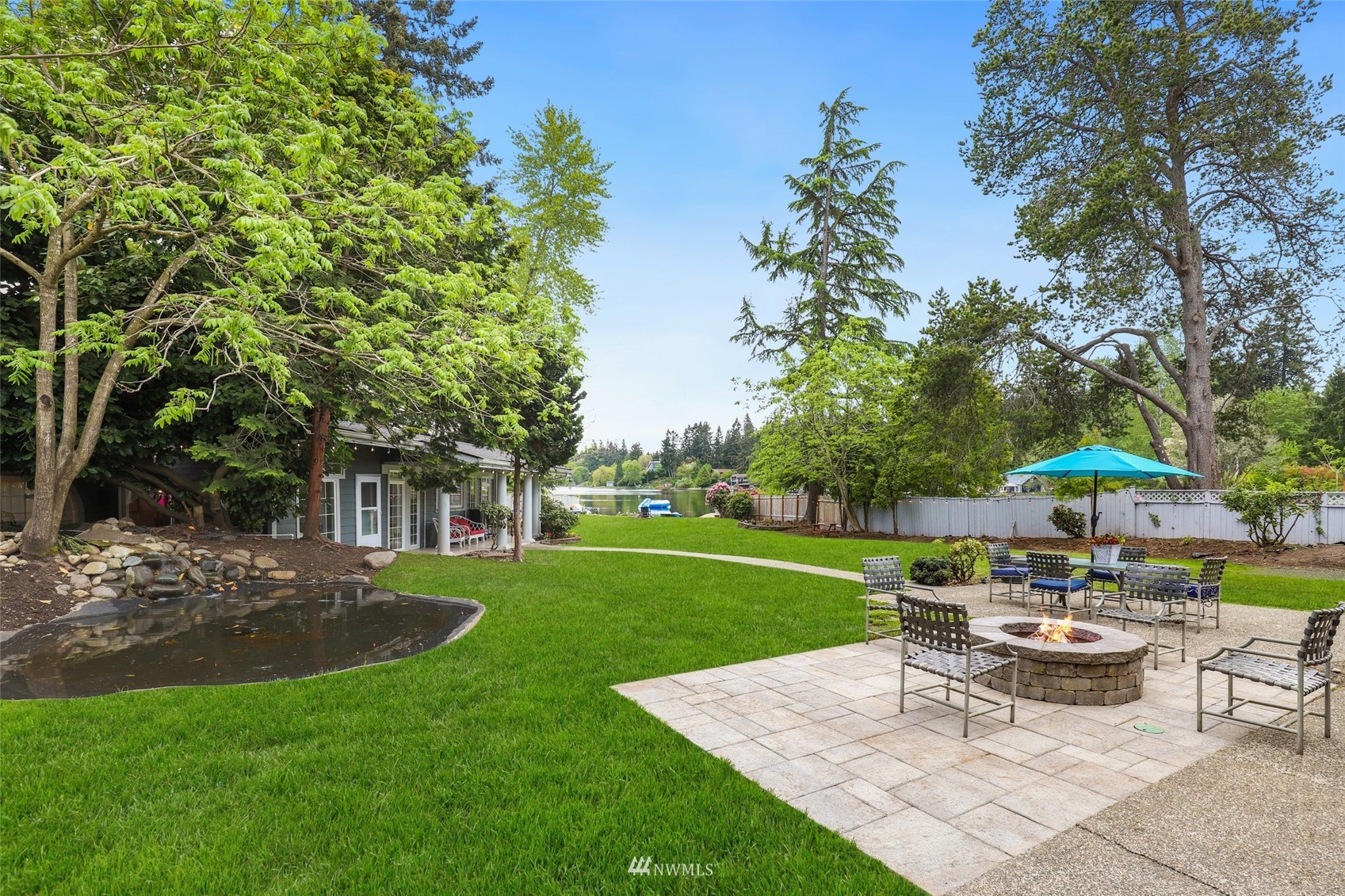 7031 Mullen Road Southeast Olympia, WA 98503 - Photo 35 of 40 a view of a house with garden and sitting area