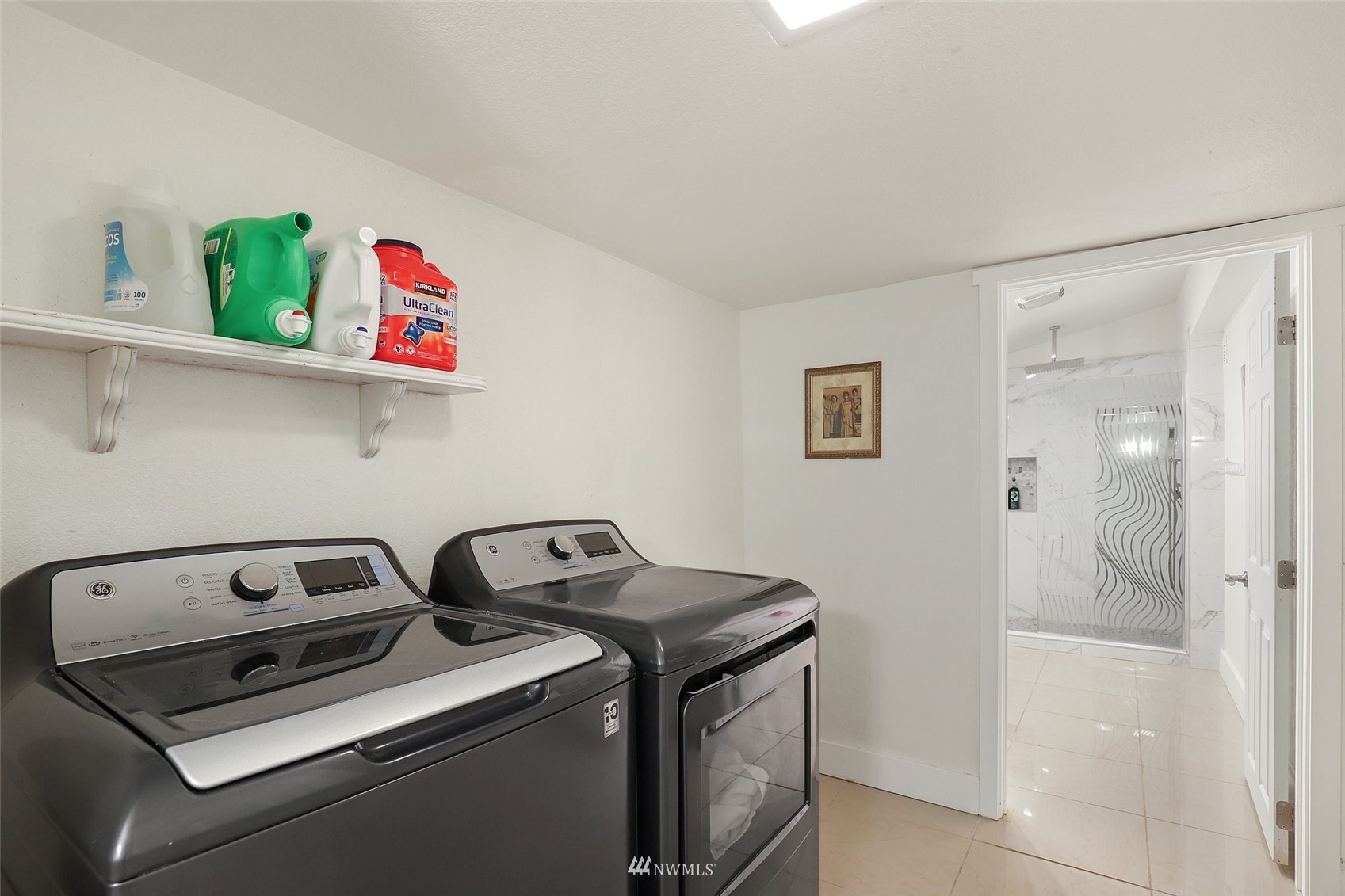 7031 Mullen Road Southeast Olympia, WA 98503 - Photo 6 of 40 a utility room with dryer and washer
