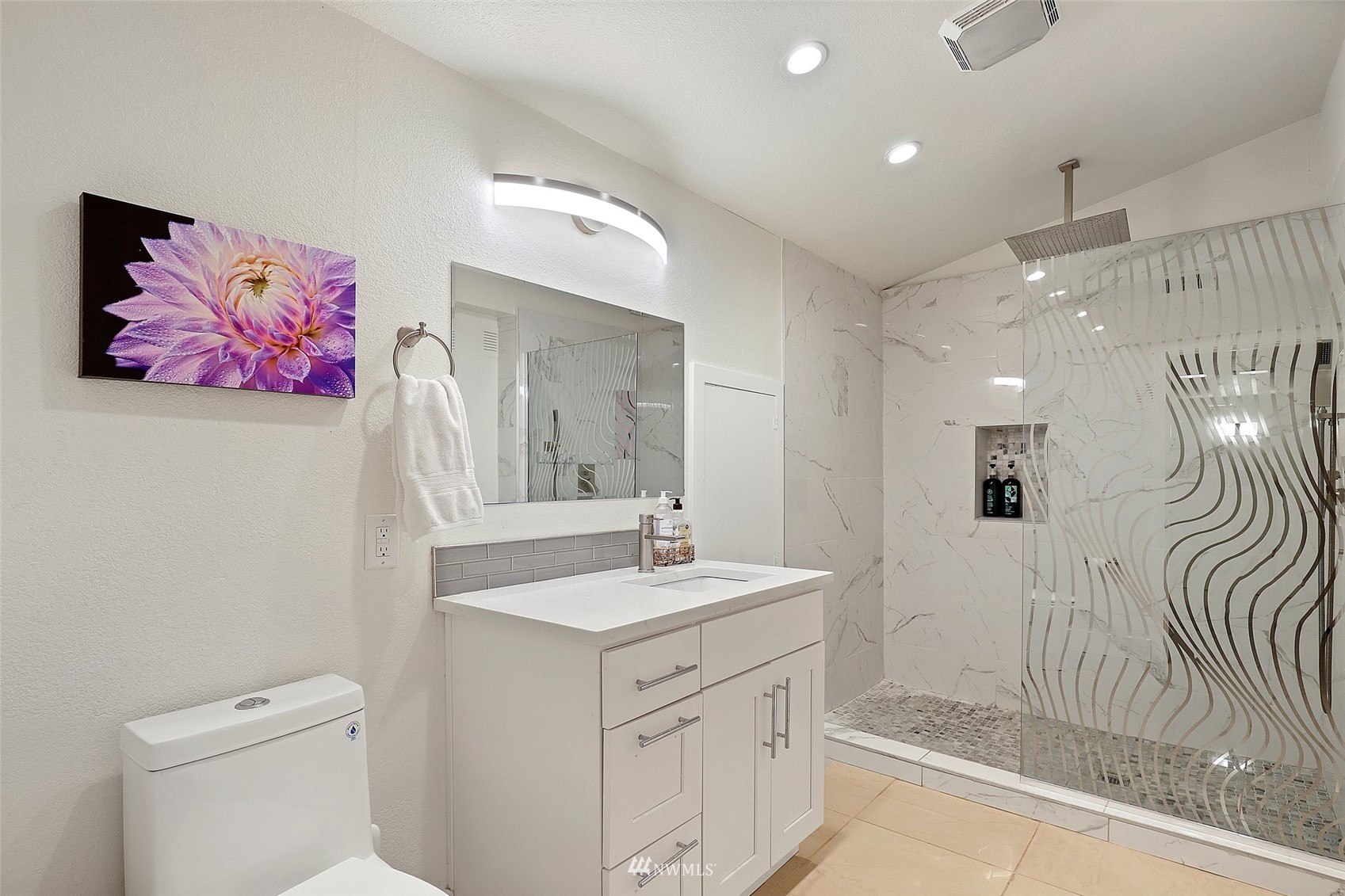 7031 Mullen Road Southeast Olympia, WA 98503 - Photo 7 of 40 a bathroom with a sink a vanity and a mirror