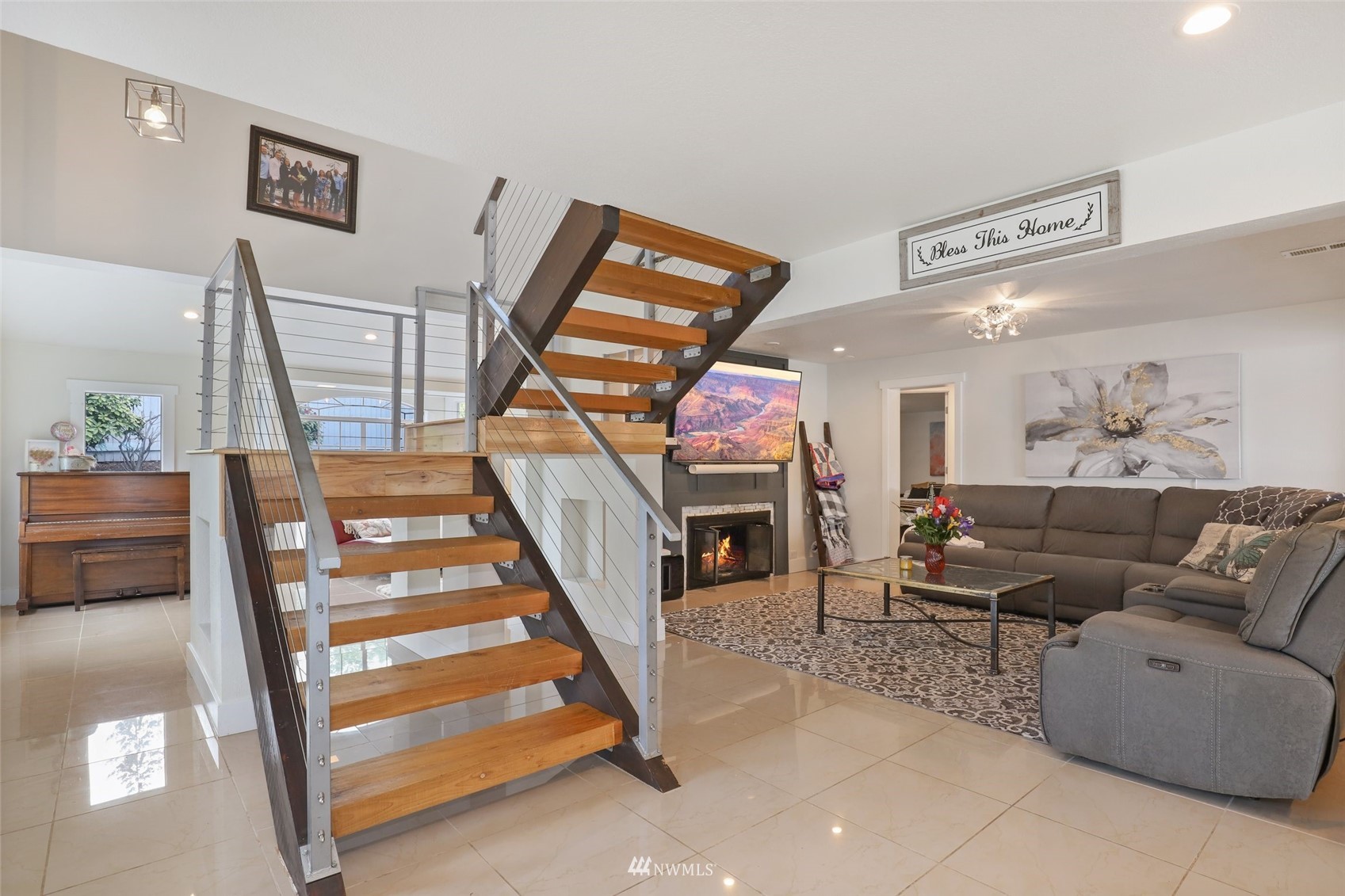 7031 Mullen Road Southeast Olympia, WA 98503 - Photo 9 of 40 a living room with furniture and a flat screen tv