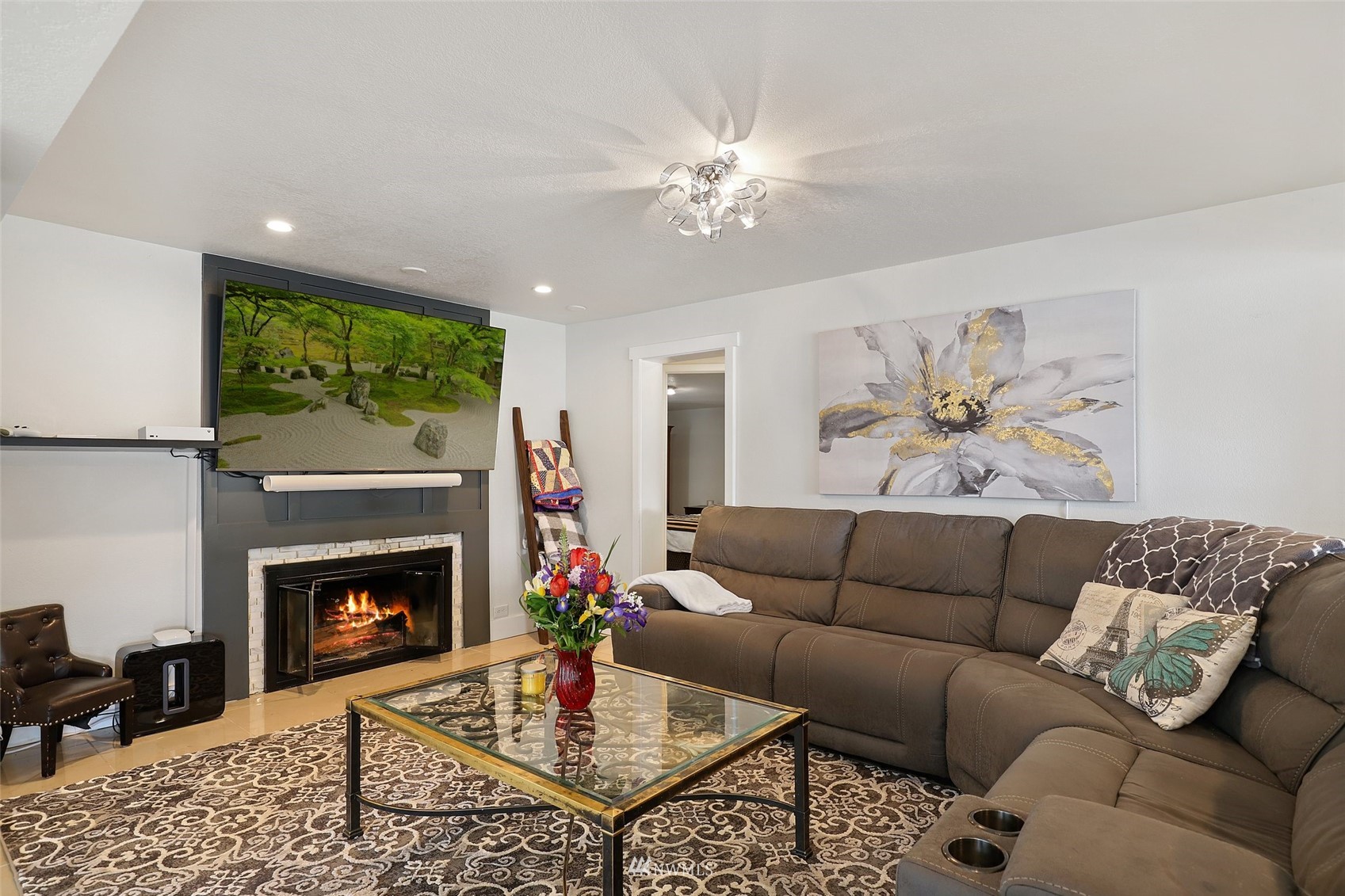 7031 Mullen Road Southeast Olympia, WA 98503 - Photo 10 of 40 a living room with furniture and a fireplace