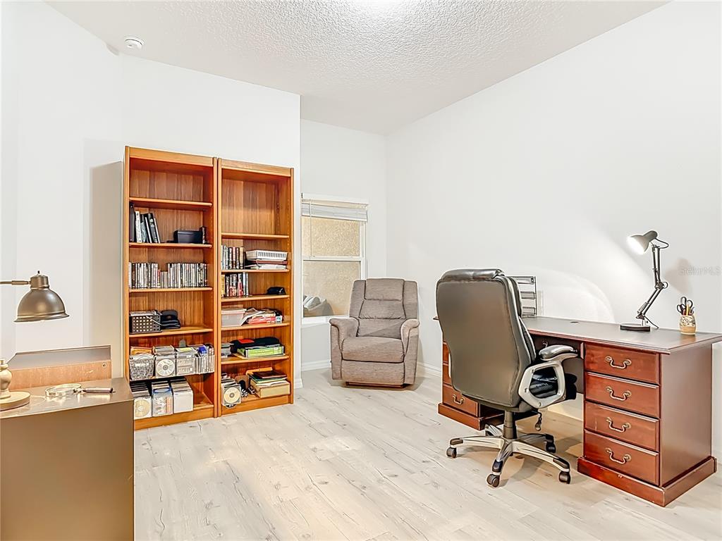 202 Walter Stevens Way DeLand, FL 32724 - Photo 27 of 34 a view of a workspace with furniture