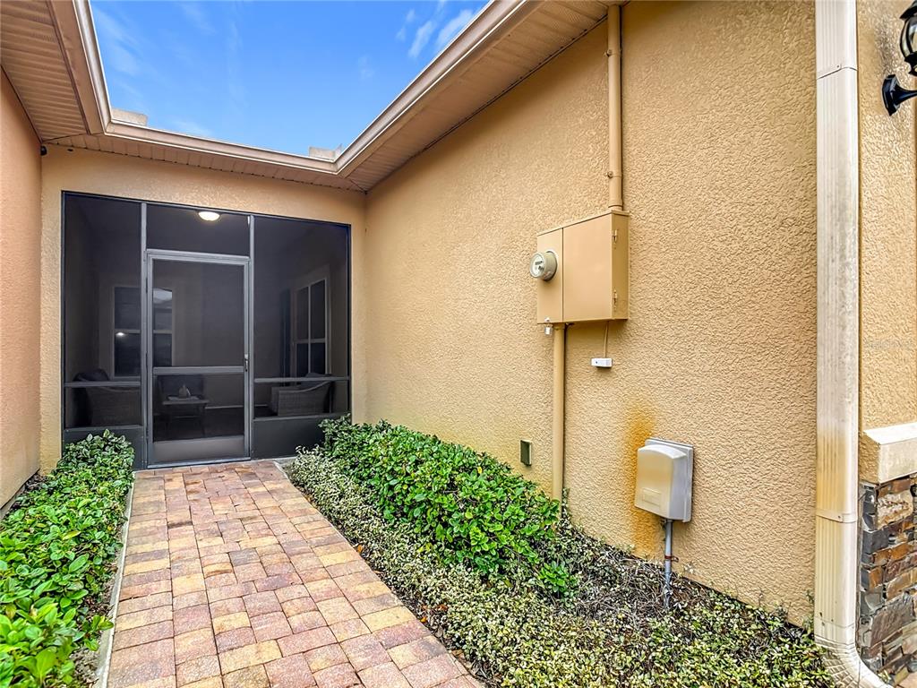 202 Walter Stevens Way DeLand, FL 32724 - Photo 3 of 34 a view of a pathway of a house