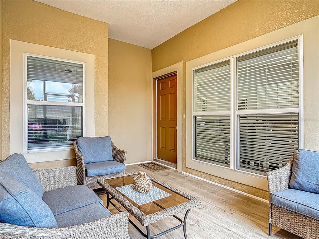 202 Walter Stevens Way DeLand, FL 32724 - Photo 5 of 34 a living room with furniture and a window