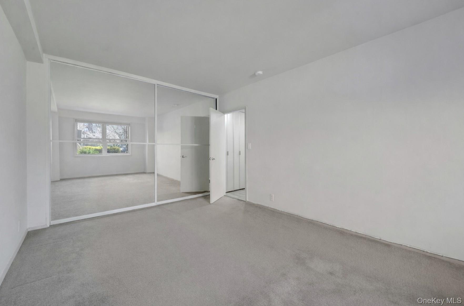 240 Garth Road, Unit 2G2 Scarsdale, NY 10583 - Photo 15 of 25 Sizeable closet in primary bedroom