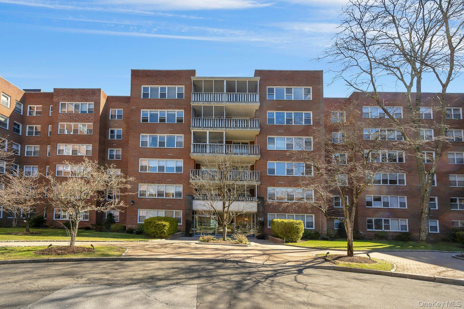 240 Garth Road, Unit 2G2 Scarsdale, NY 10583 - Photo 19 of 25 Closer view of front of building