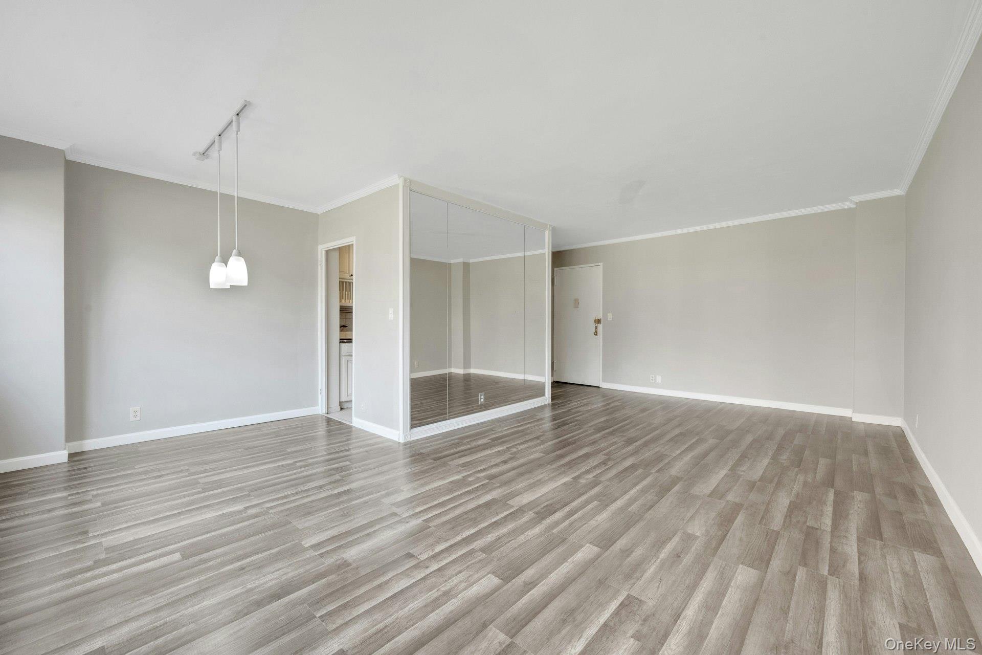 240 Garth Road, Unit 2G2 Scarsdale, NY 10583 - Photo 6 of 25 Spacious living room and dining area