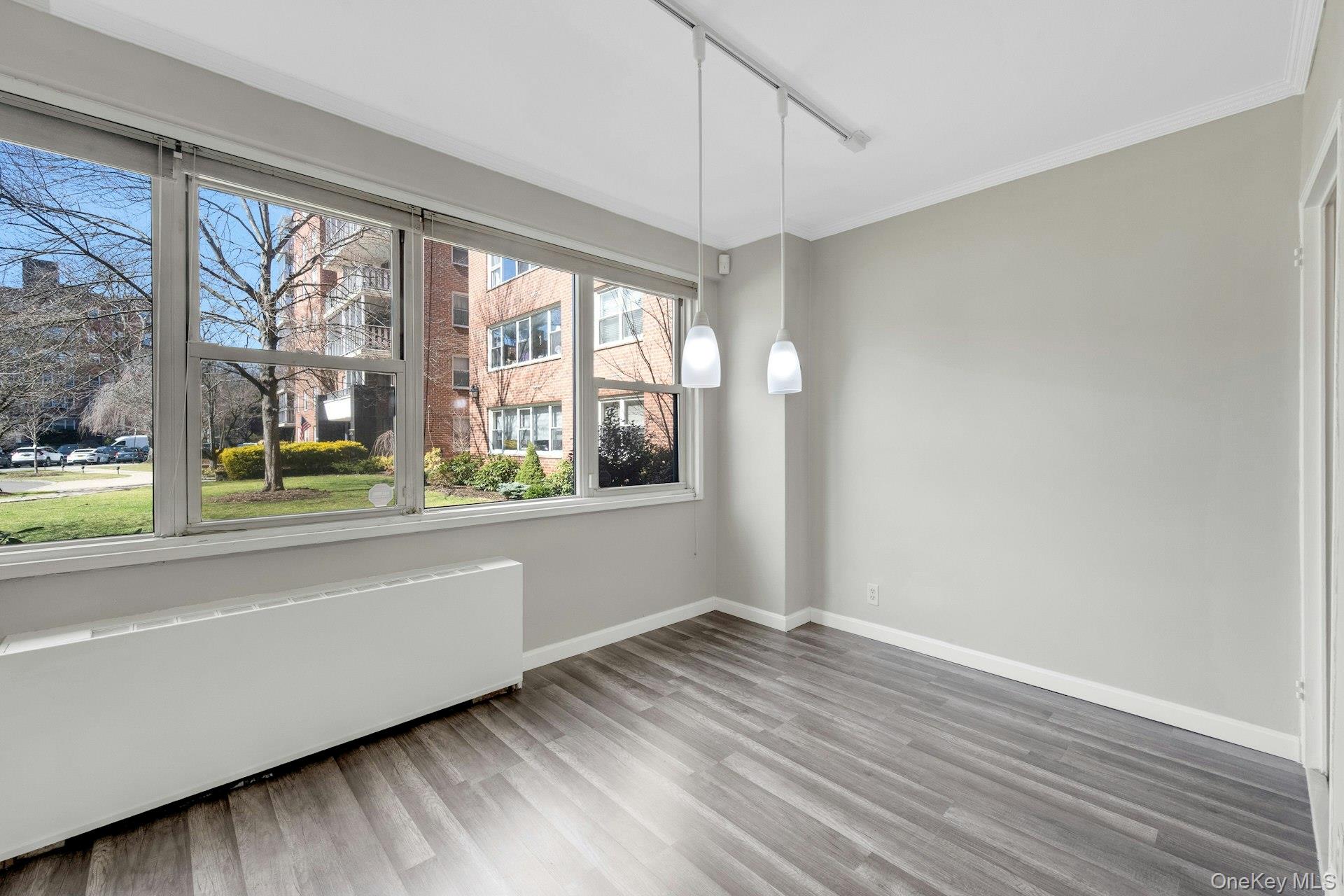 240 Garth Road, Unit 2G2 Scarsdale, NY 10583 - Photo 7 of 25 Dining area with lots of light
