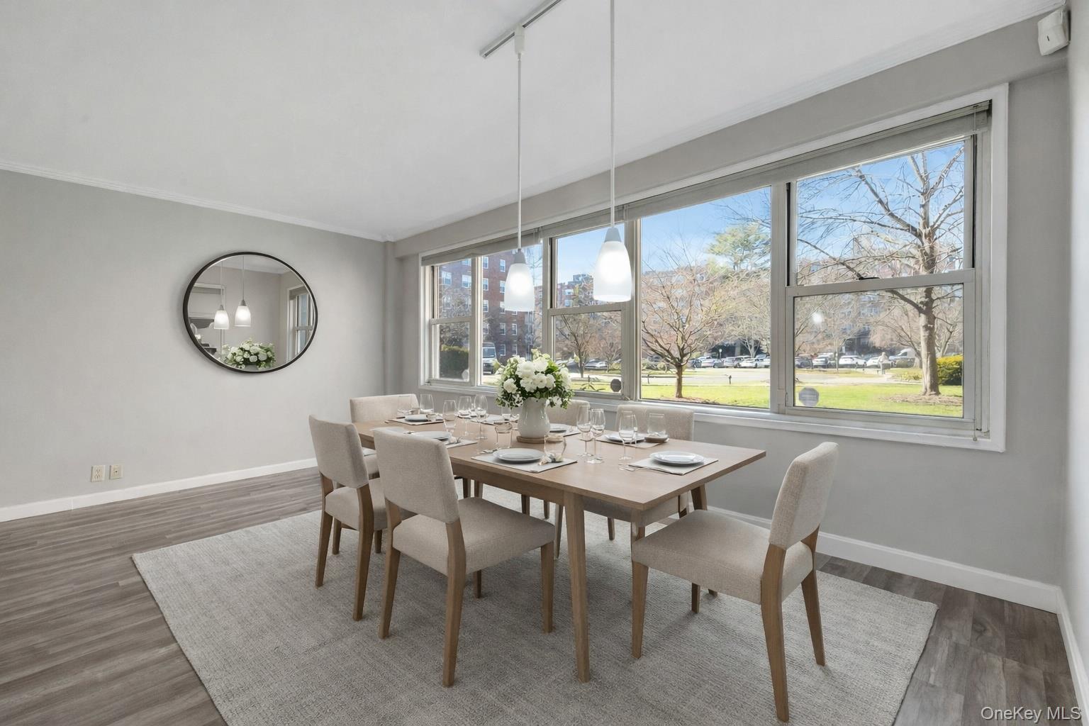 240 Garth Road, Unit 2G2 Scarsdale, NY 10583 - Photo 8 of 25 Light and bright dining area - Virtually Staged