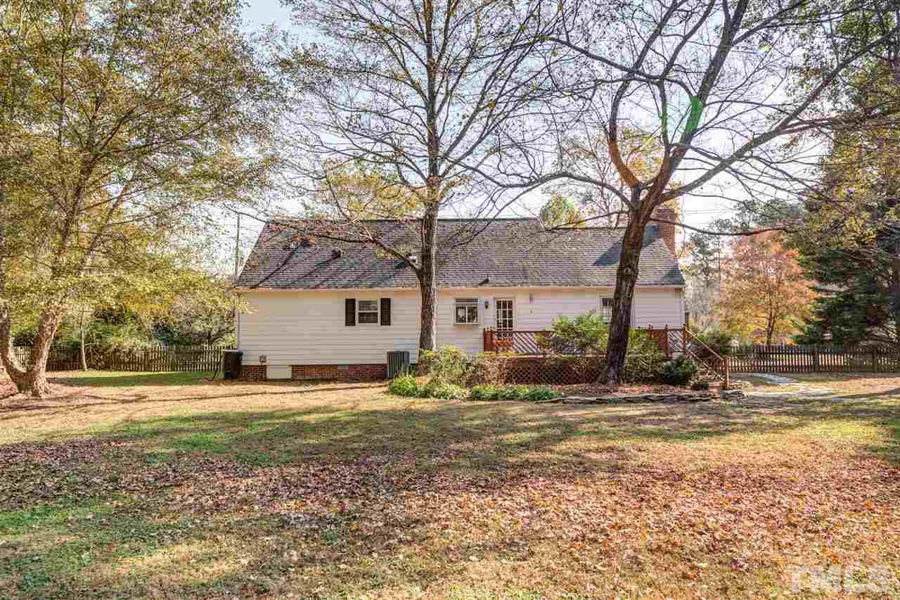 8236 Bells Lake Road Apex, NC 27539 - Photo 16 of 25 Imagine watching the seasons change from your deck, and enjoying the privacy of your fenced yard year-round.
