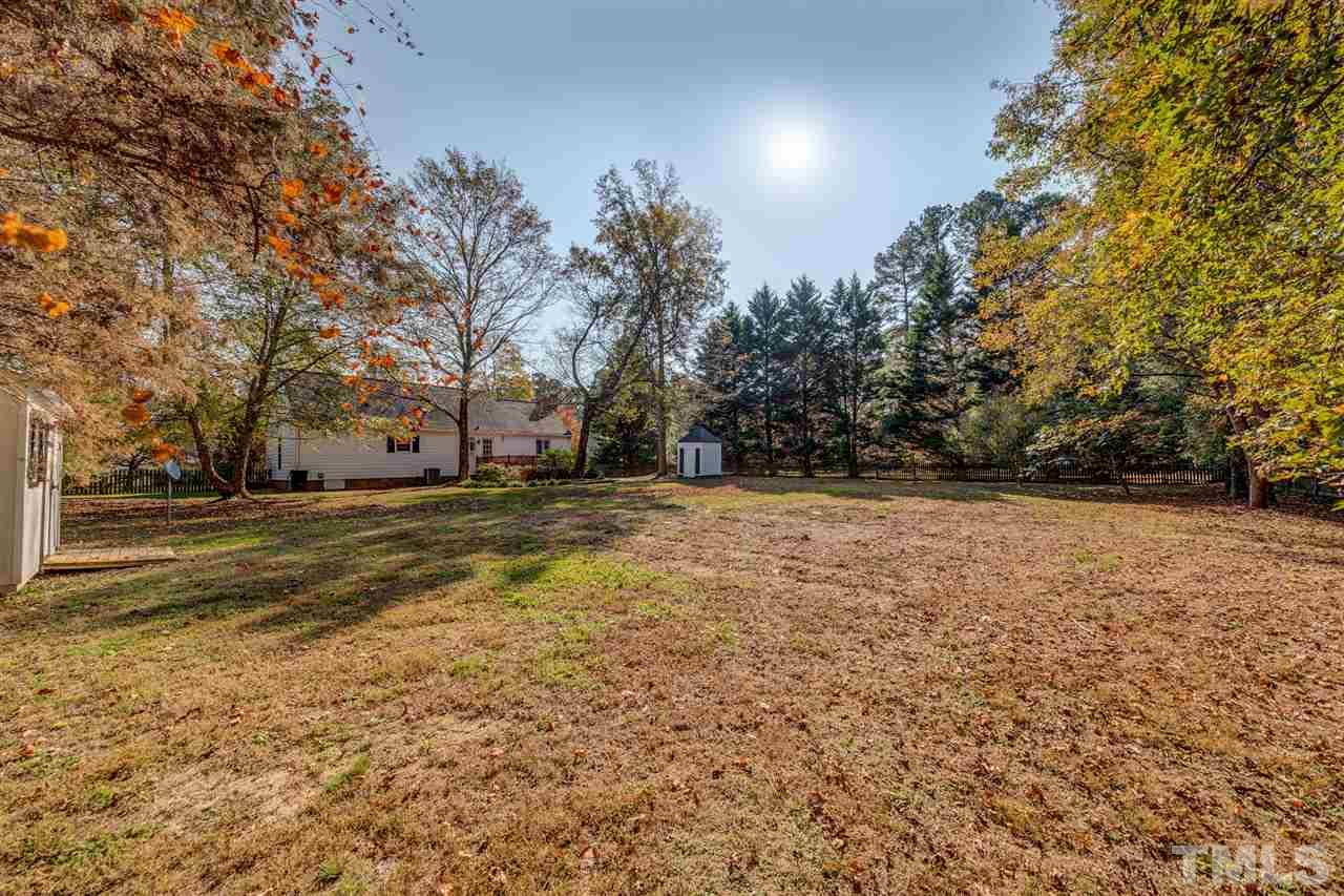 8236 Bells Lake Road Apex, NC 27539 - Photo 17 of 25 Your expansive rear yard awaits. You will love the flat and fenced yard, perfect for entertaining, gardening, and pets.