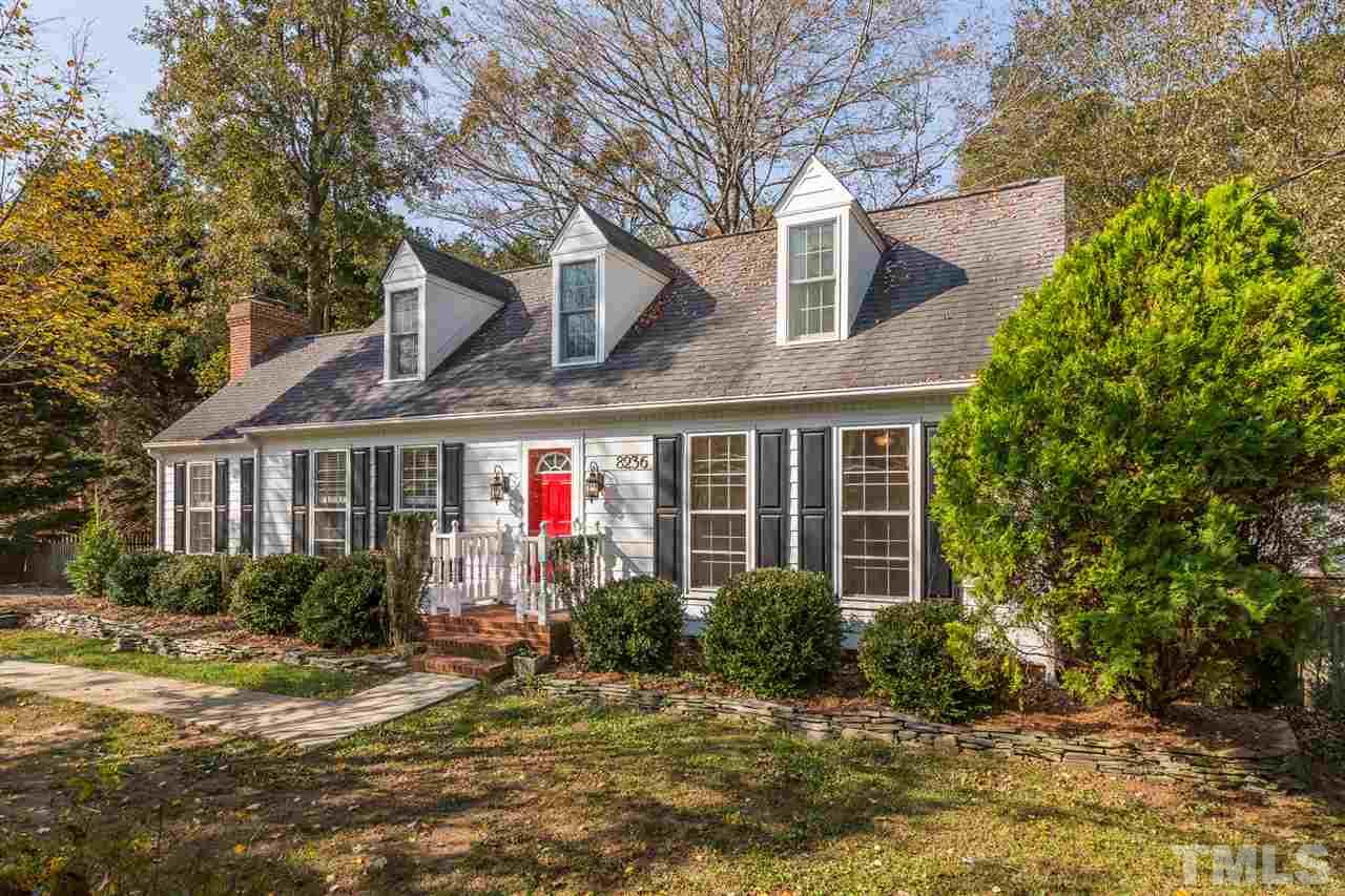 8236 Bells Lake Road Apex, NC 27539 - Photo 22 of 25 Gorgeous Cape Cod design, expansive yard on a corner lot, and hardwood trees. This home has it all!