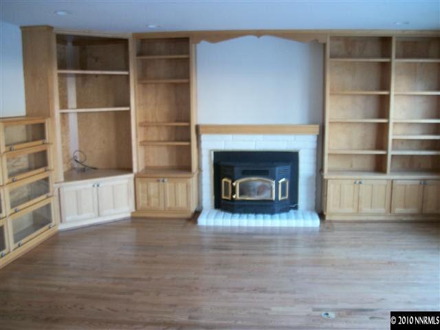 1702 Del Rosa Way Sparks, NV 89434 - Photo 5 of 11 a living room with a fireplace