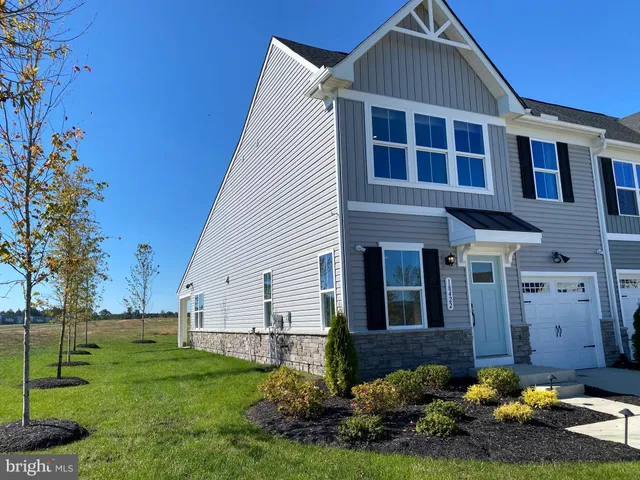 a view of a house with a garden