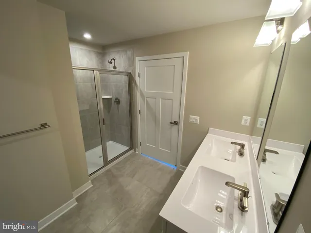 a view of a bathroom with a glass door