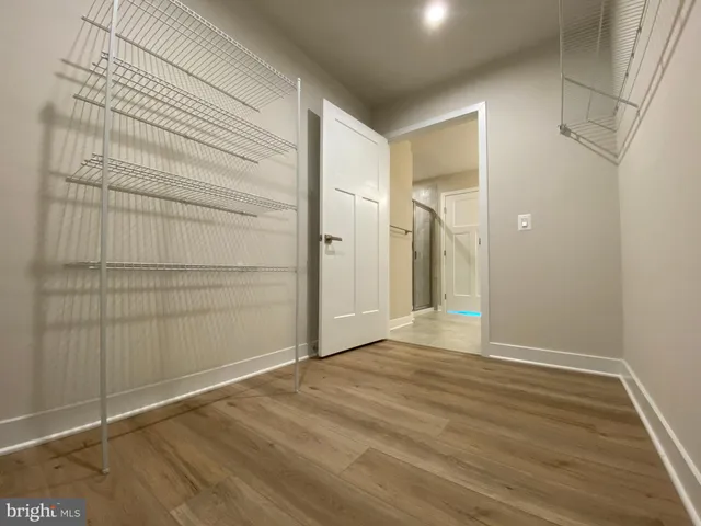 a bathroom with a shower and a toilet
