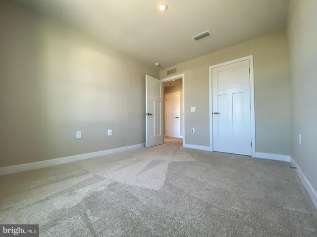 a view of a kitchen with a stove and a fireplace