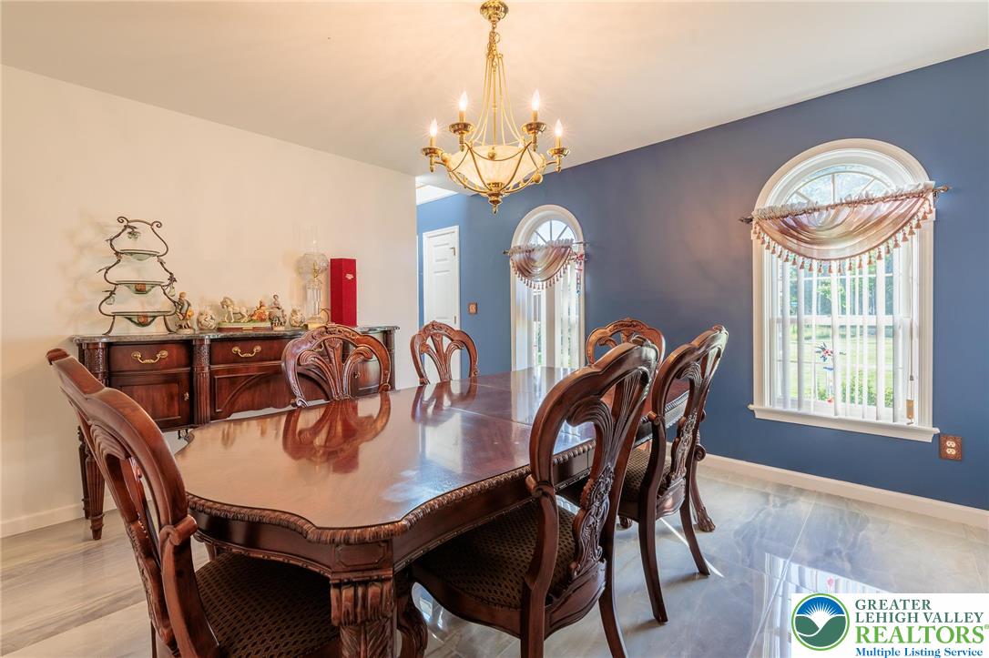 2170 Clearview Road Coplay, PA 18037 - Photo 18 of 75 This dining room features elegant flooring and lighting, perfect for gatherings.