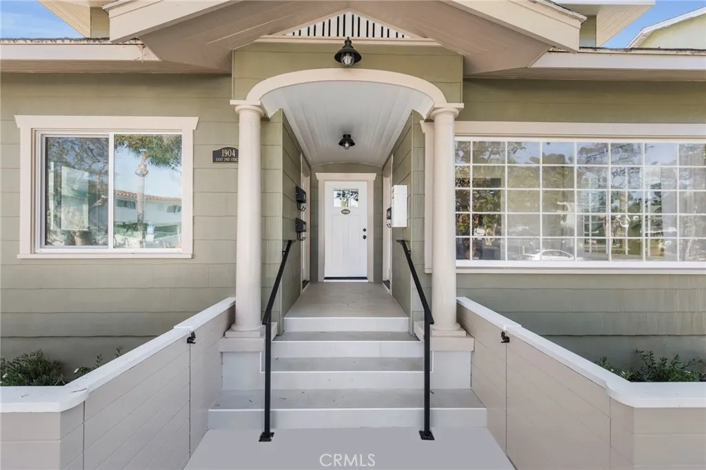 a front view of a house with entryway