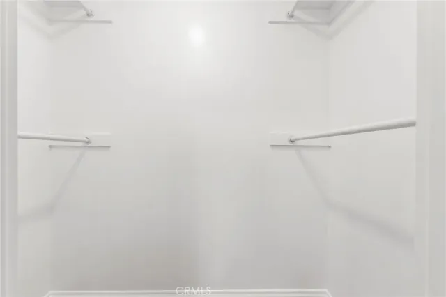 a view of small space with racks on the wall