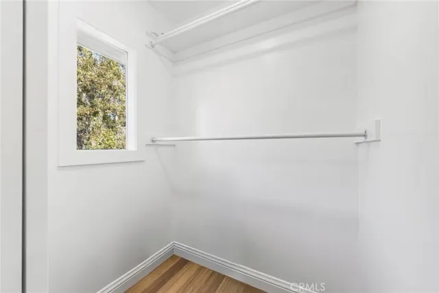 a view of a room with racks on the wall