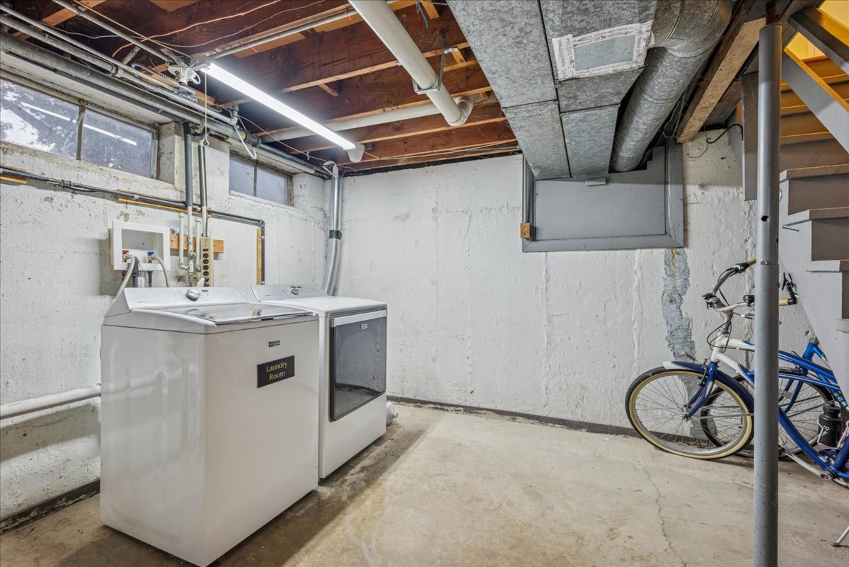 512 Busse Road Mount Prospect, IL 60056 - Photo 17 of 24 a view of a storage & utility room with a sink