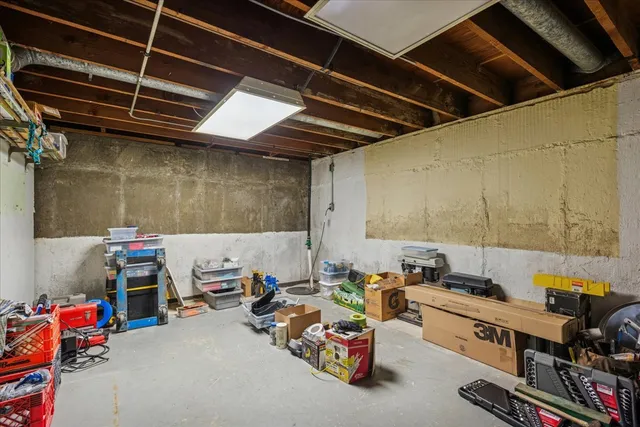 a storage room with lots of furniture