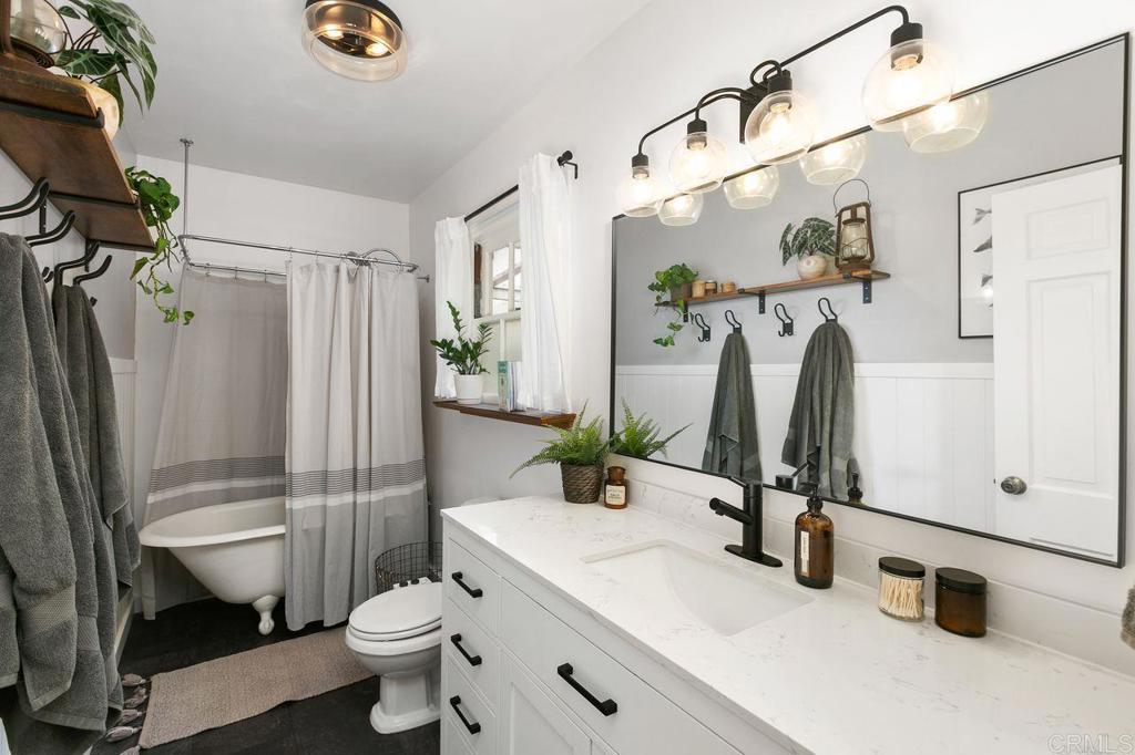 4321 Gordon Way La Mesa, CA 91942 - Photo 13 of 27 a bathroom with a sink toilet and shower