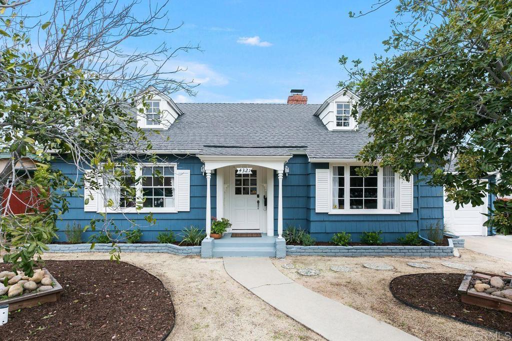 4321 Gordon Way La Mesa, CA 91942 - Photo 2 of 27 a front view of a house with yard and parking
