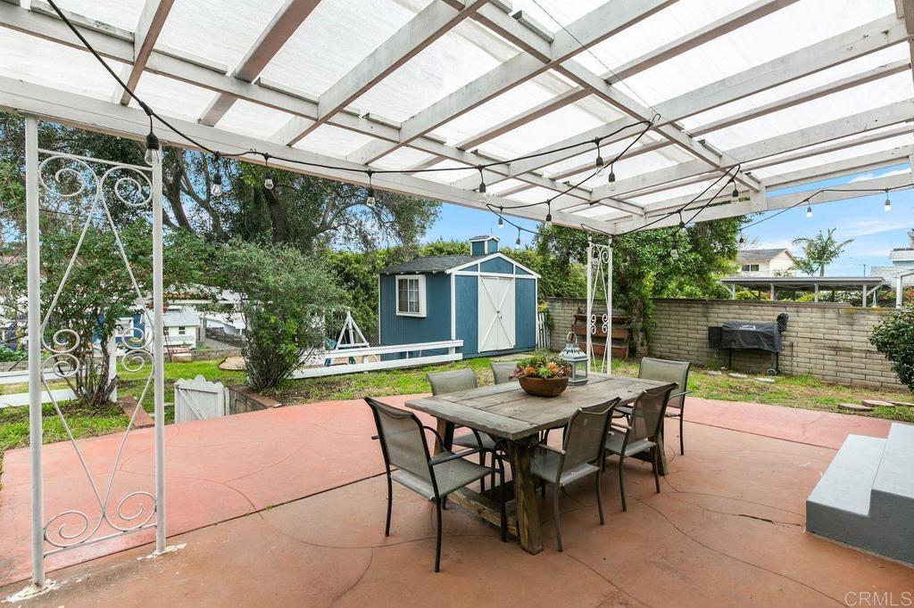 4321 Gordon Way La Mesa, CA 91942 - Photo 24 of 27 a view of a patio with a table and chairs and potted plants