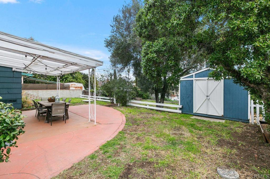 4321 Gordon Way La Mesa, CA 91942 - Photo 25 of 27 a view of a patio with a table and chairs and potted plants