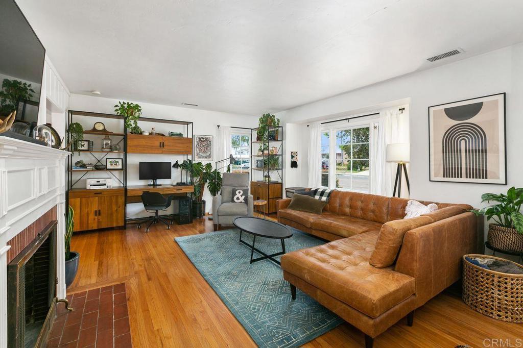 4321 Gordon Way La Mesa, CA 91942 - Photo 6 of 27 a living room with furniture and a fireplace