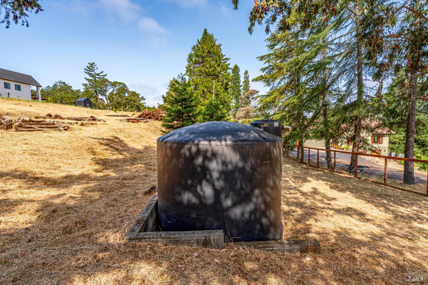 4187 Bayberry Drive Santa Rosa, CA 95404 - Photo 16 of 24 a view of a yard with wooden fence