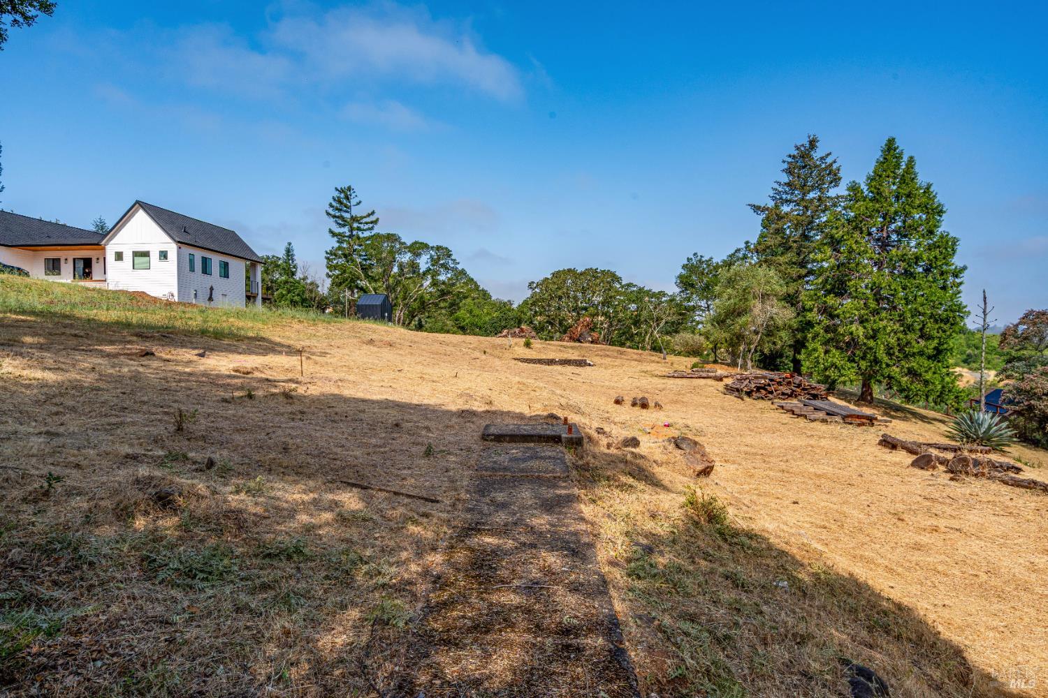 4187 Bayberry Drive Santa Rosa, CA 95404 - Photo 2 of 24 a view of a house with a yard