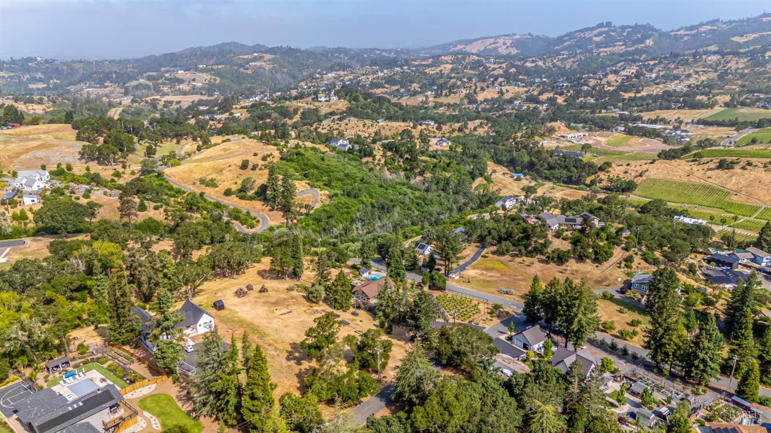 4187 Bayberry Drive Santa Rosa, CA 95404 - Photo 10 of 24 an aerial view of residential houses with outdoor space and trees