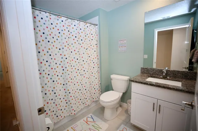 a view of a large pool with an outdoor space