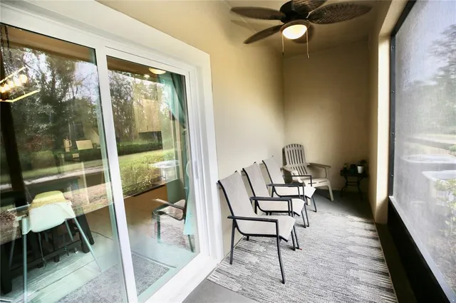 a view of a swimming pool with a yard