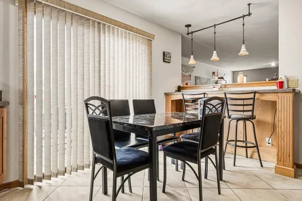 a view of a dining room with furniture