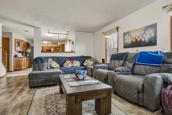 a living room with furniture and a couch