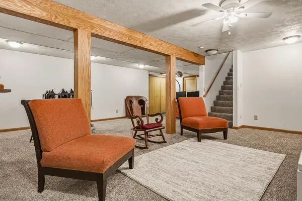 a room with furniture and wooden floor