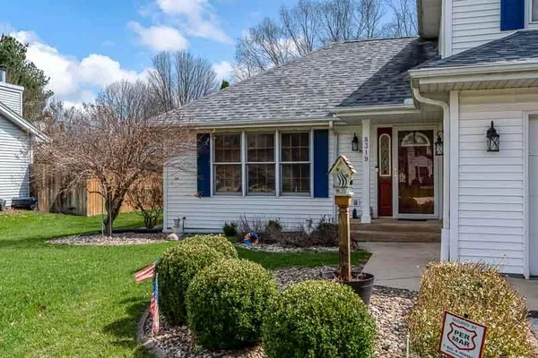 a view of a house with garden