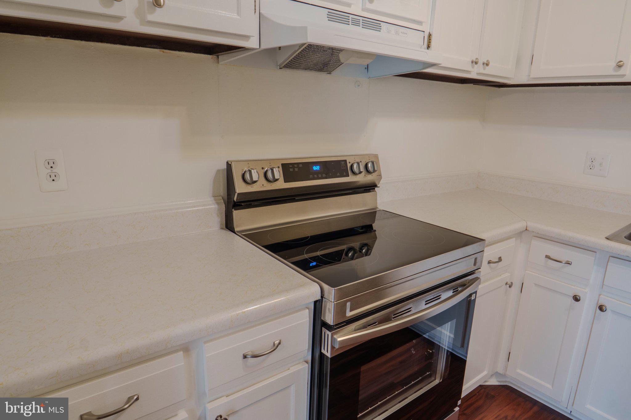 6147 Edsall Road, Unit N Alexandria, VA 22304 - Photo 12 of 28 Modern kitchen with sleek finishes.